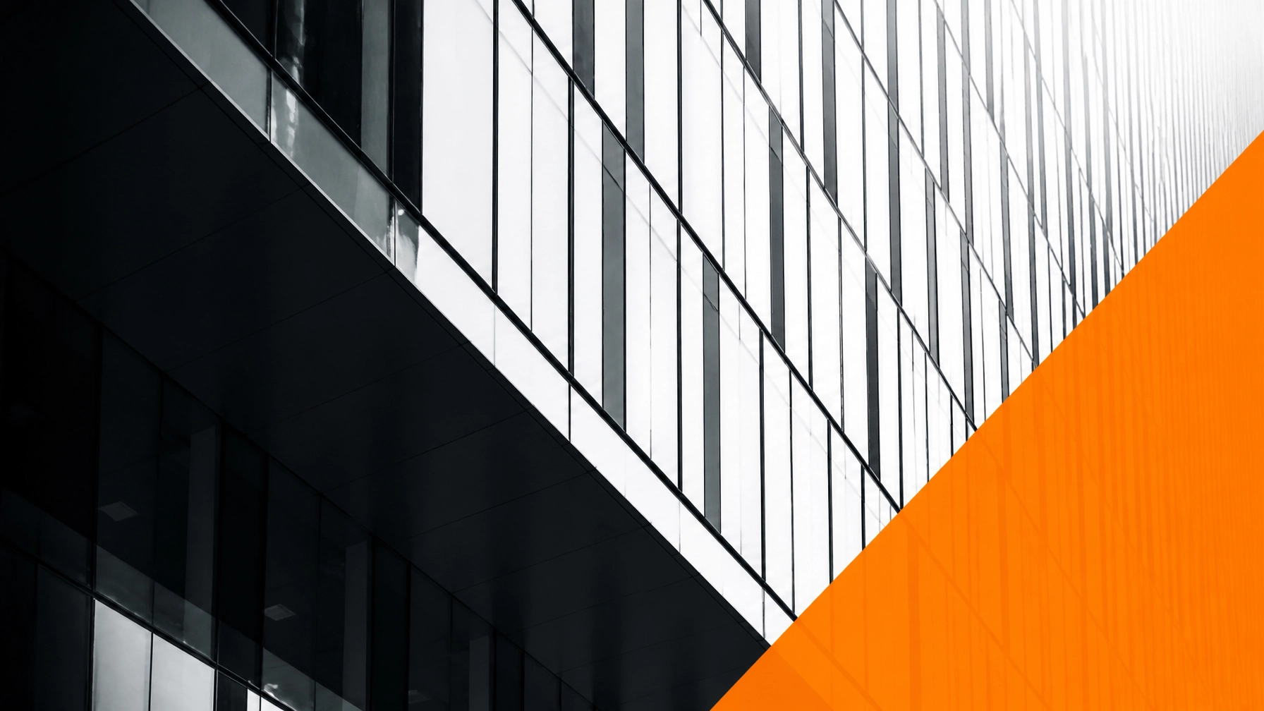 Abstract architectural facade with repetitive geometric panels representing reliability and scale in software architecture